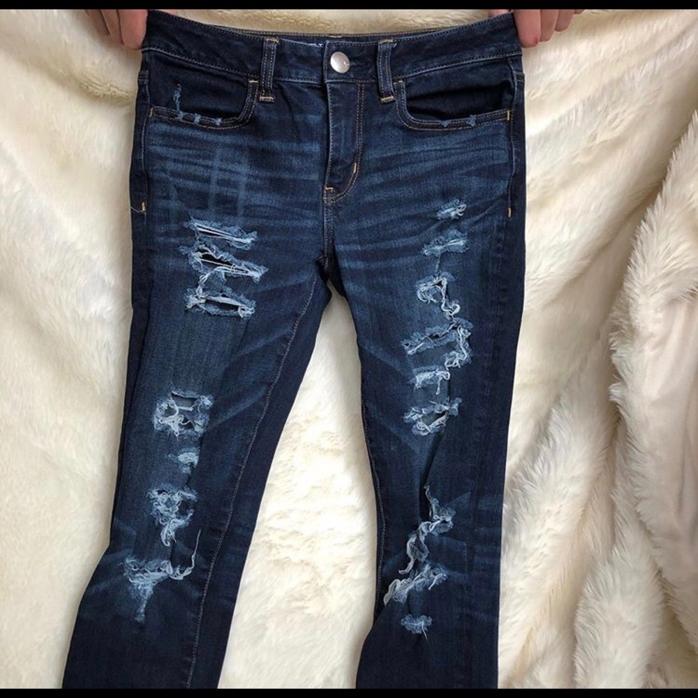 Dark wash, super stretch ripped skinny jeans